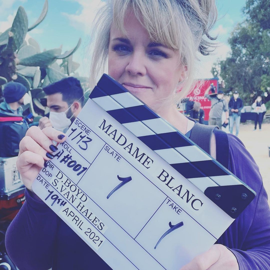 Sally Lindsay with clap board