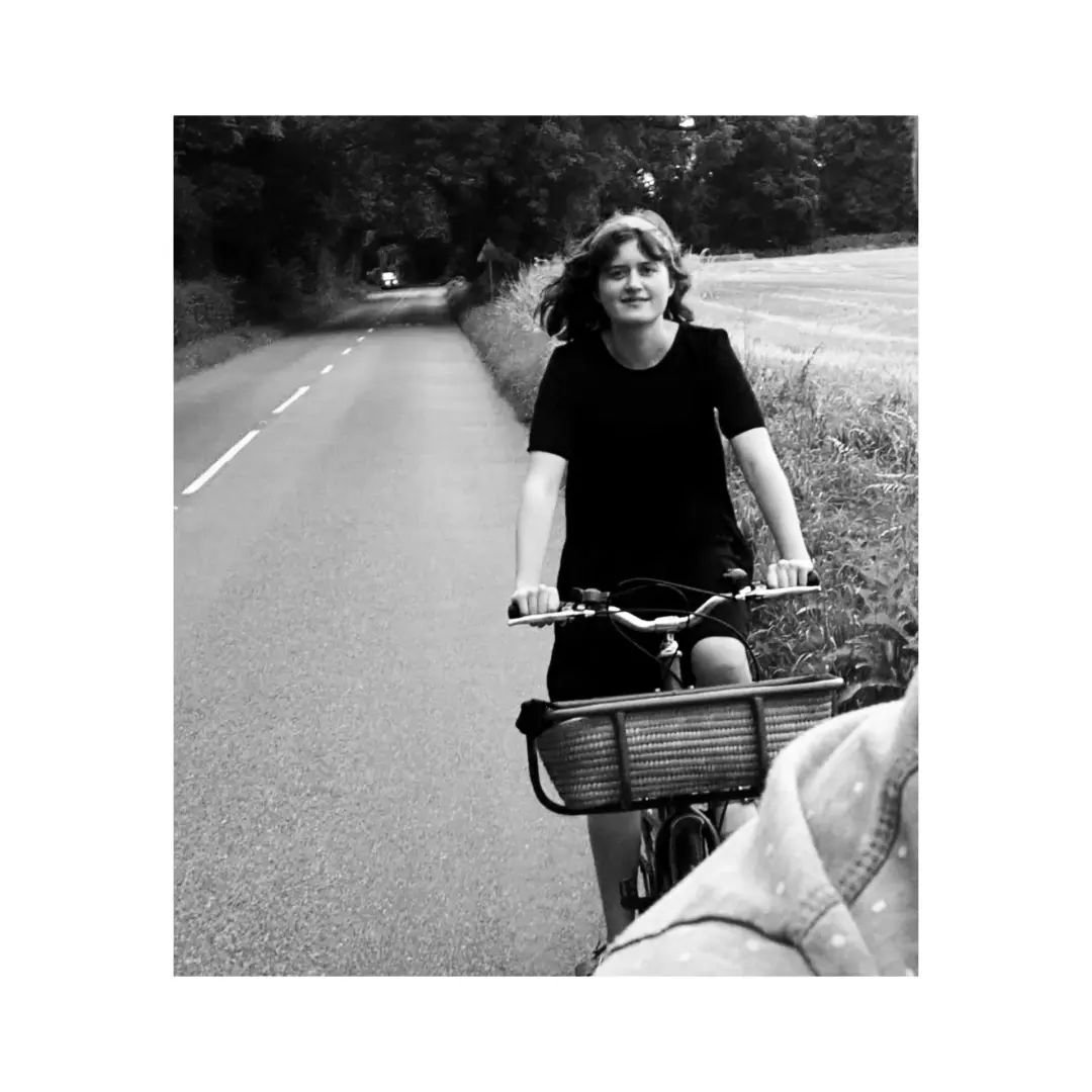 Ella Bruccoleri riding a bicycle