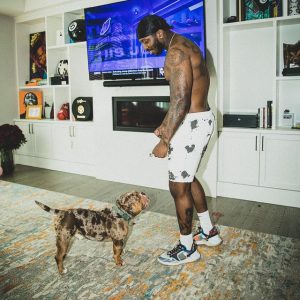 Pardison Fontaine with his pet