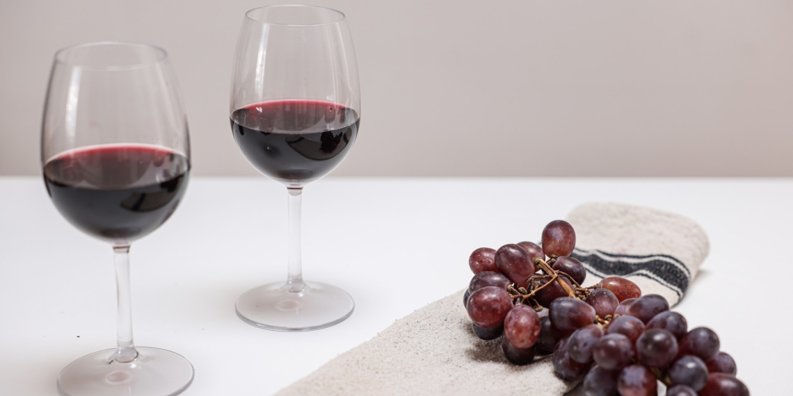 delicious red wine with grapes