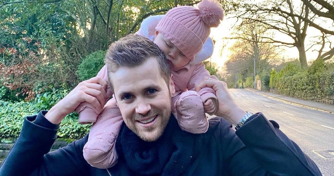 Sam Quek's husband with their daughter
