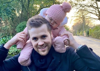 Sam Quek's husband with their daughter