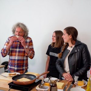 James May eating a sandwich