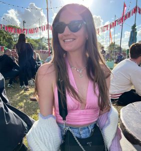 Molly Louisa Whitehall in a pink top