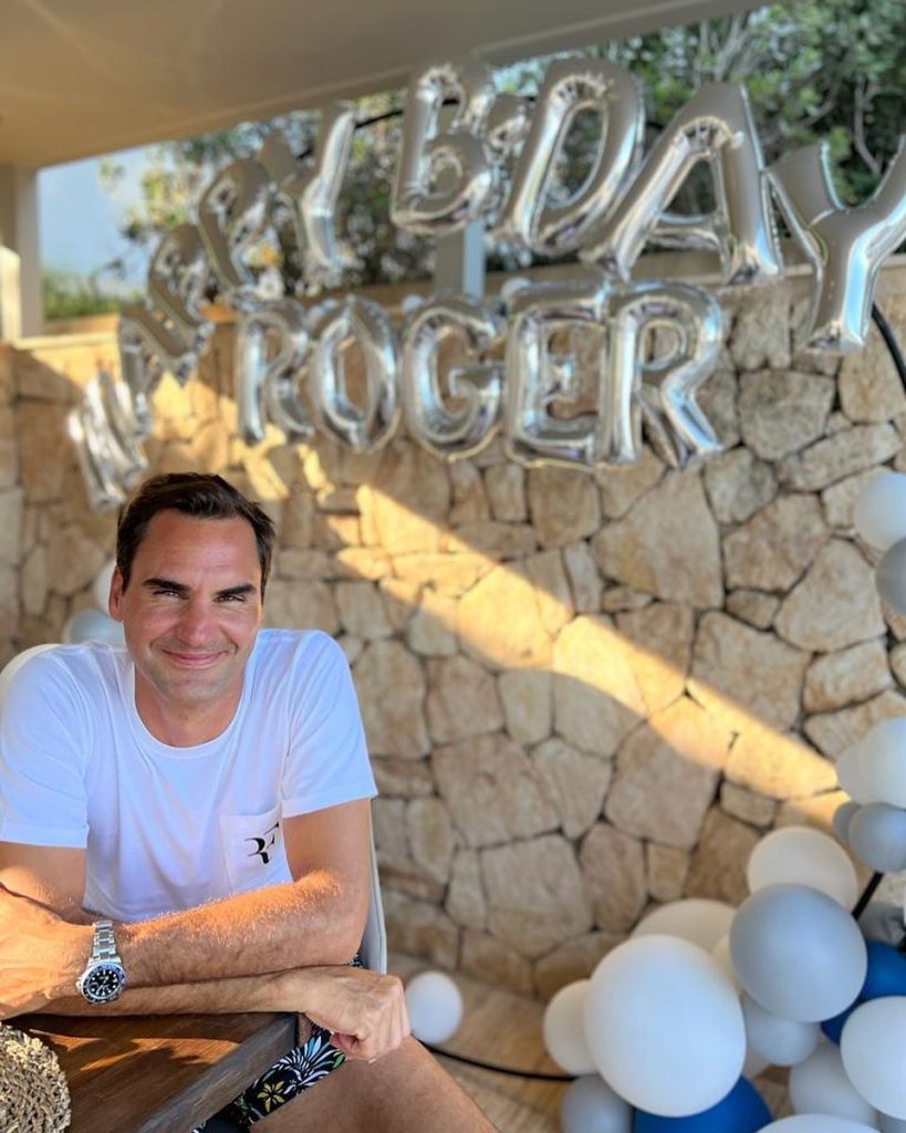 Roger Federer in white t-shirt