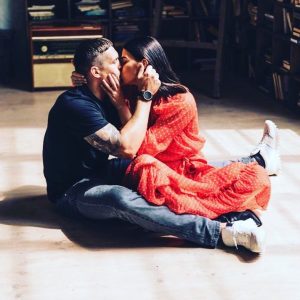 Oleksandr kissing his wife