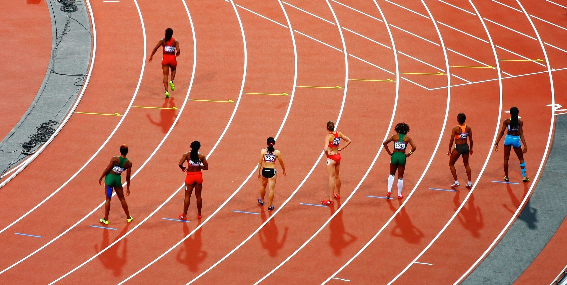 Girls running on track