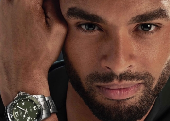 Tose Page Brother wearing watch and posing