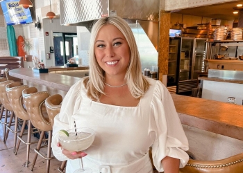 Alaina Mathers posing happily for a picture