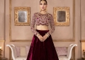 Model wearing a red lehenga from the Kanwal Malik Official Collection