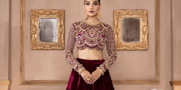 Model wearing a red lehenga from the Kanwal Malik Official Collection