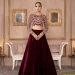Model wearing a red lehenga from the Kanwal Malik Official Collection