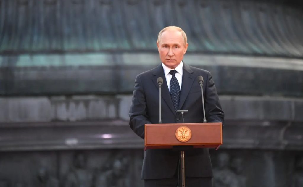 Vladimir Putin making a speech at a gala concert marketing