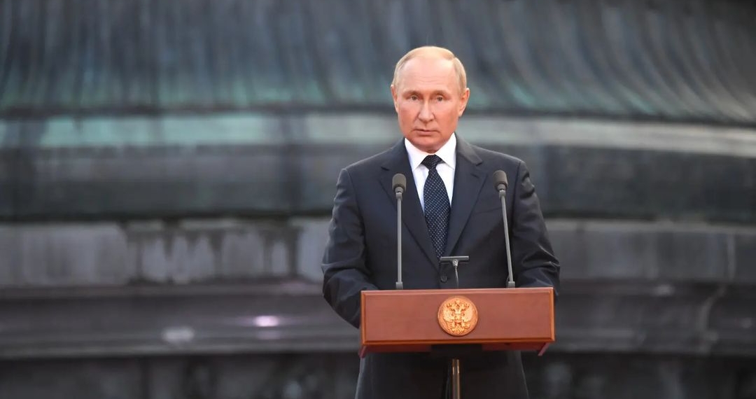 Vladimir Putin making a speech at a gala concert marketing
