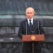 Vladimir Putin making a speech at a gala concert marketing
