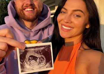 Kristen Hanby and Jasmine Brownsword with the sonography picture of their baby