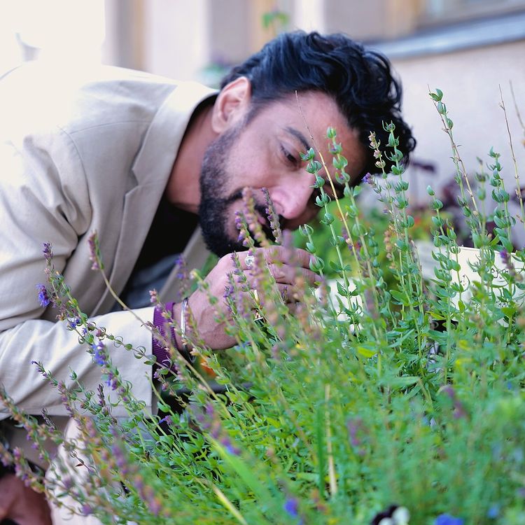 Ranveer Brar looking at the green grass