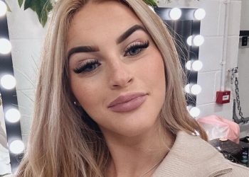 Singer Sophie Aspin in beige top