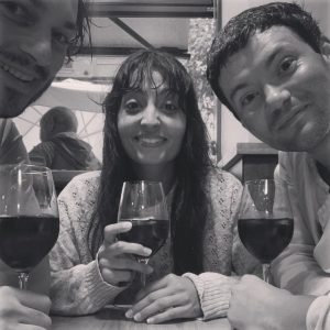Kit Lewis and friends drinking wine