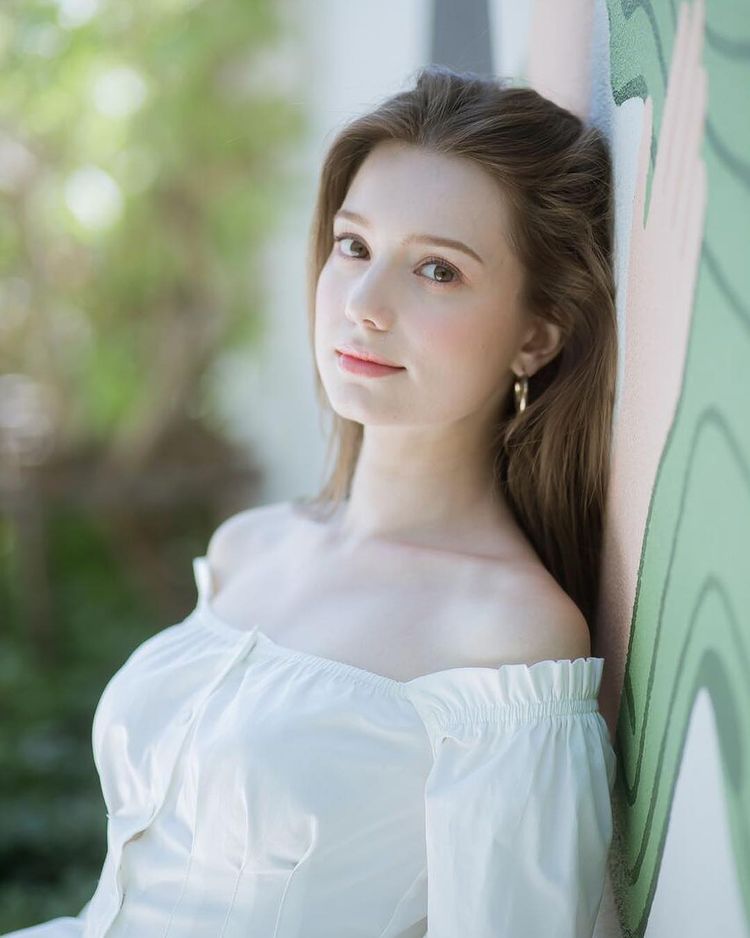 Anastasia in white top